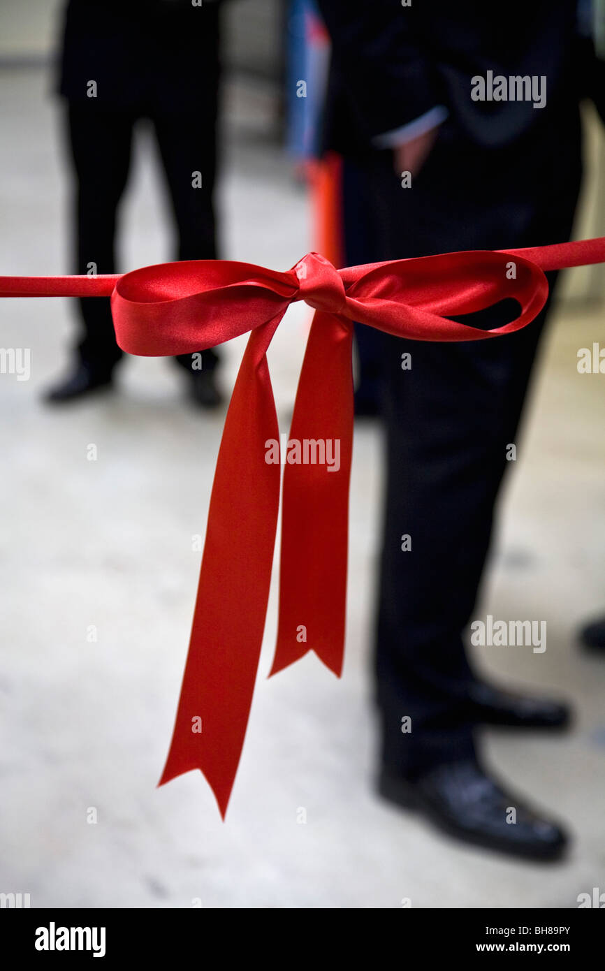 Detail of a red ribbon barrier Stock Photo