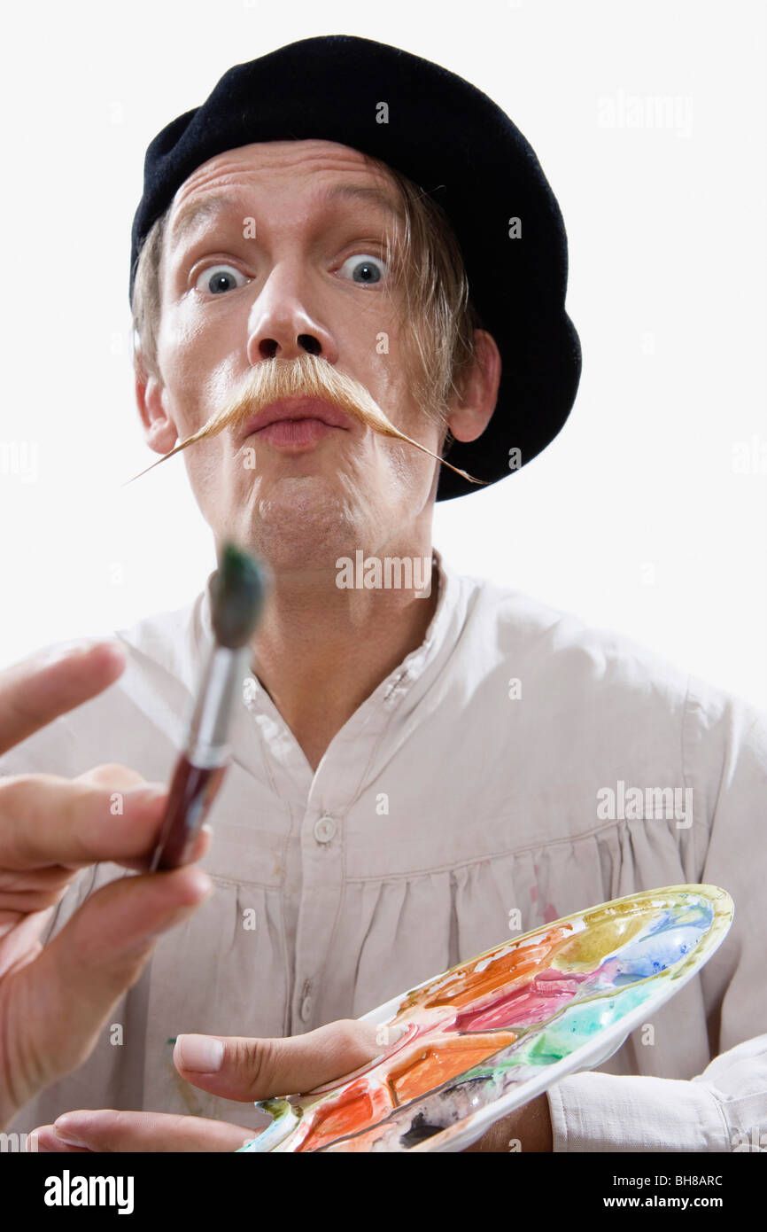 A man dressed like a stereotypical painter Stock Photo