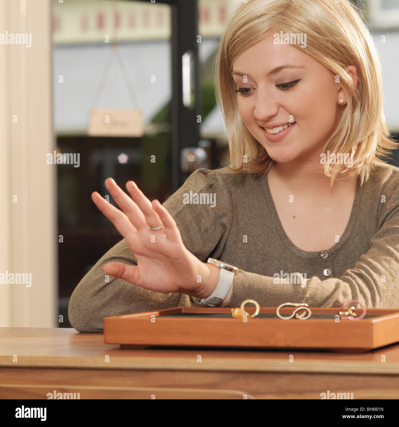 woman trying on ring Stock Photo