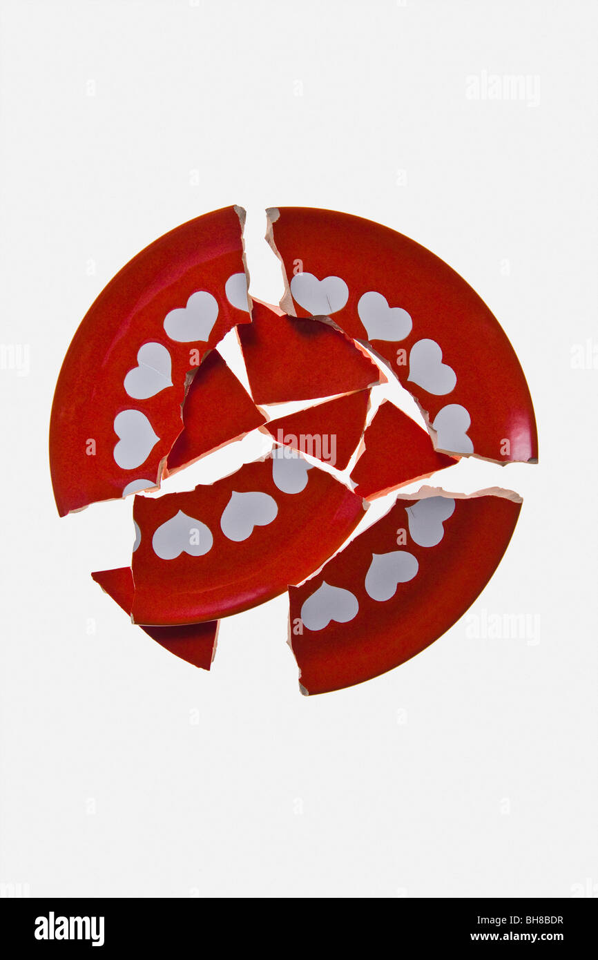 A broken plate with heart shapes Stock Photo