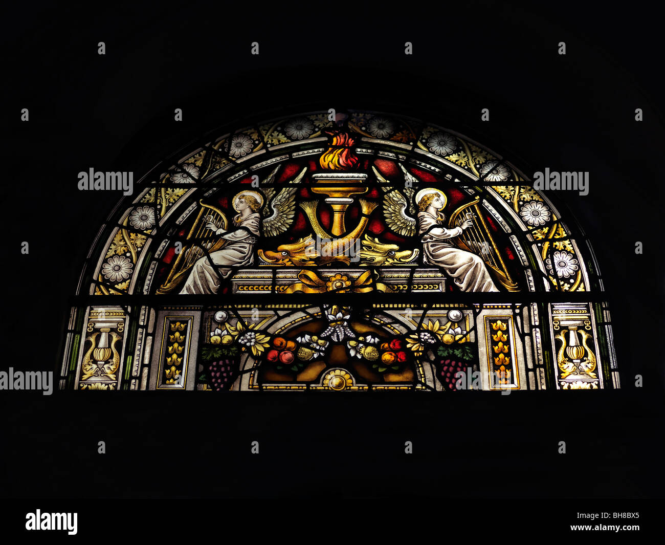 Wesley's Chapel City Road Islington London England Stained Glass Window Showing Angels Playing Harps and Dragon Fish Stock Photo