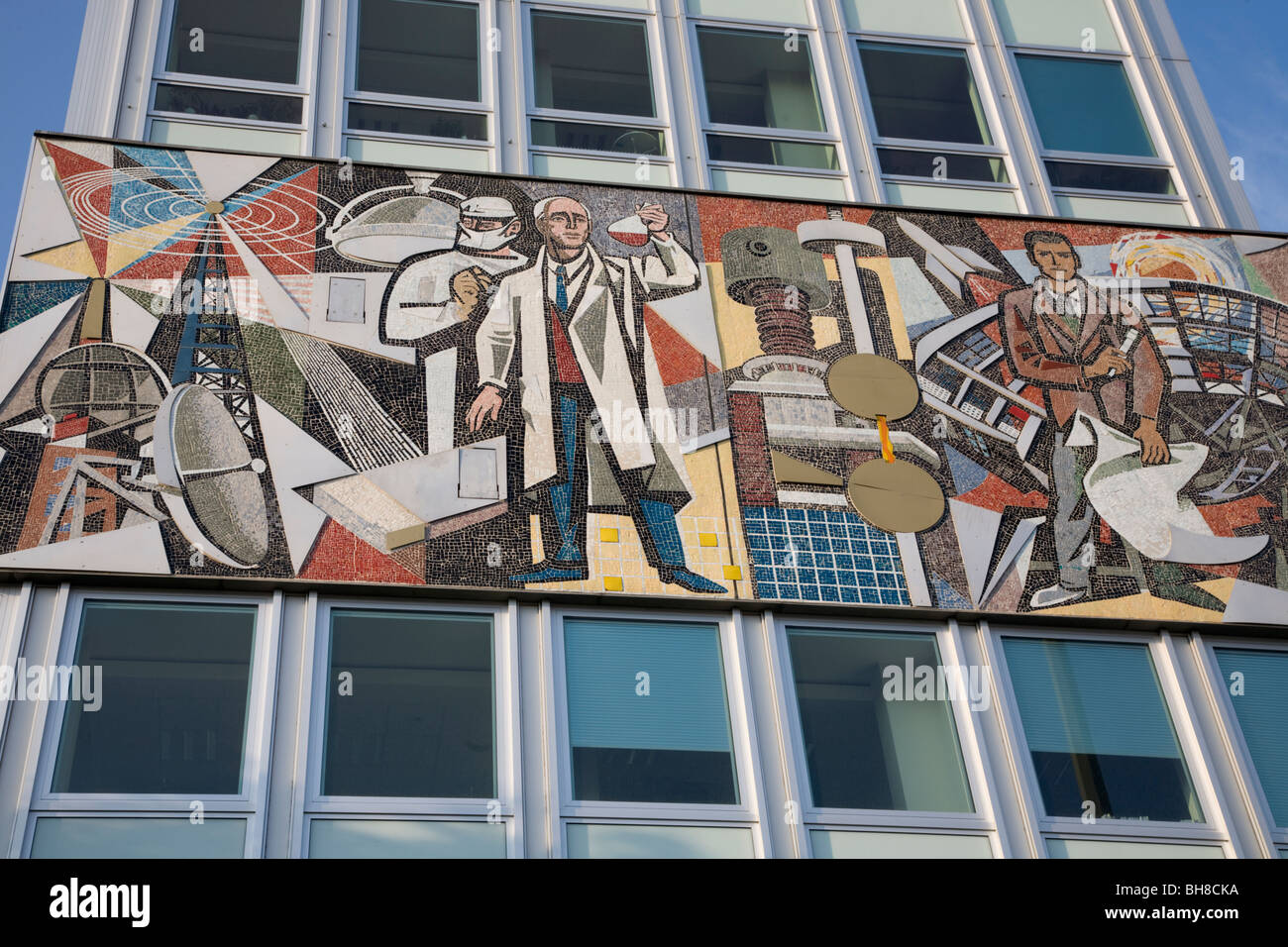 East German Communist Mural On Haus Des Lehrers Berlin Germany Stock