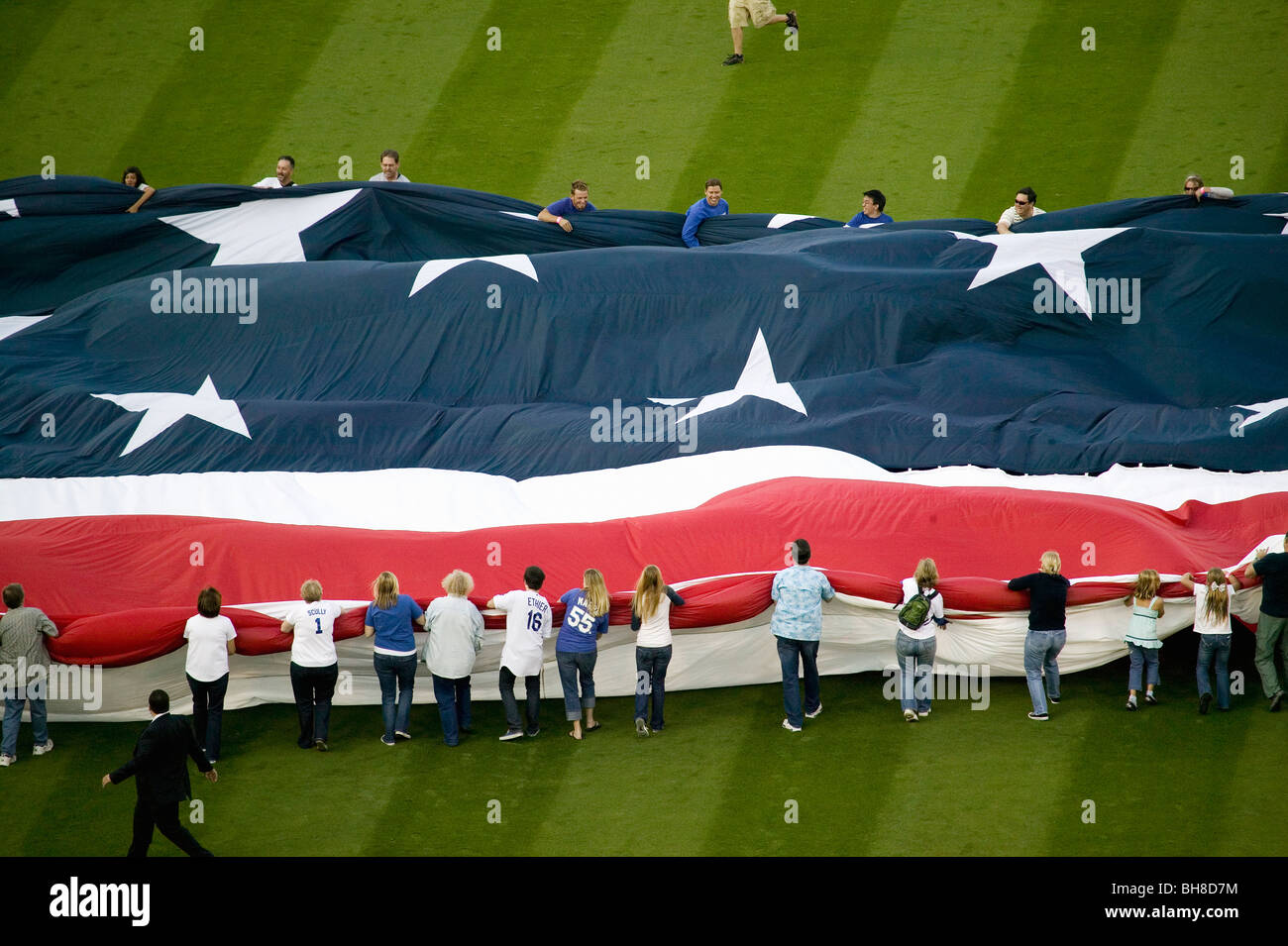 Unfurling of gigantic American Flag during opening ceremony of National League Championship Series (NLCS), Dodger Stadium, Los A Stock Photo