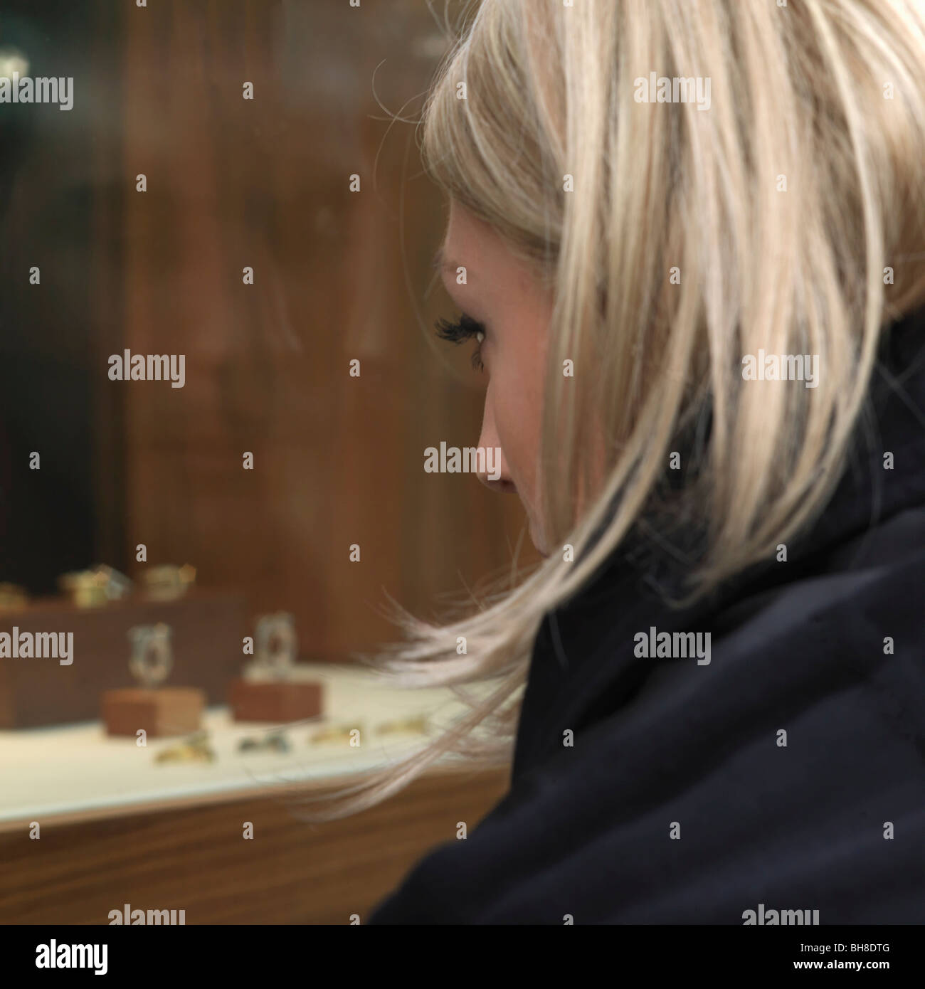 woman looking at shop window Stock Photo