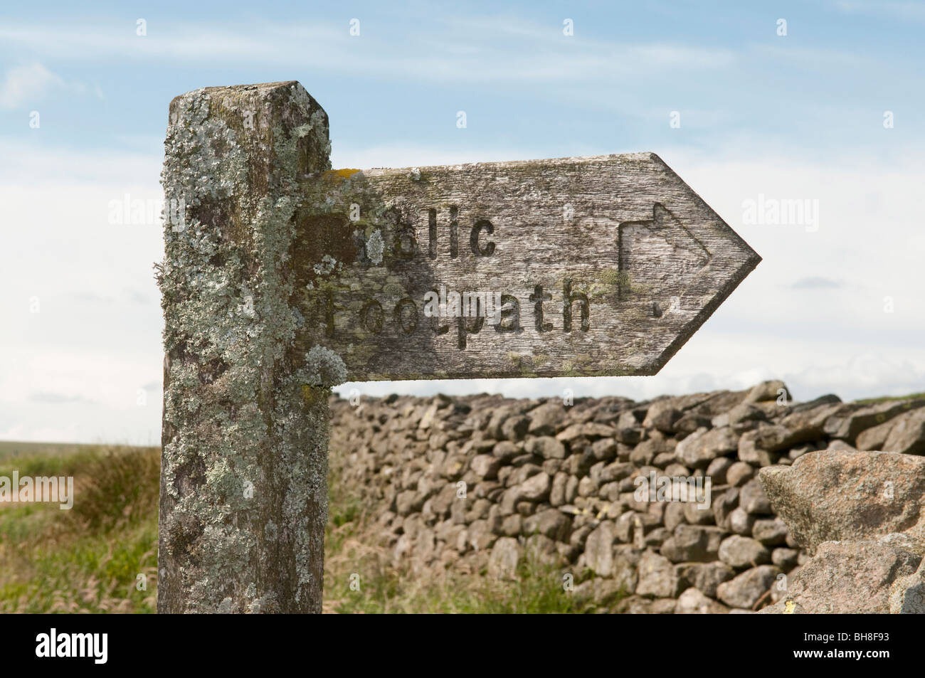 Old wooden public footpath signpost Stock Photo