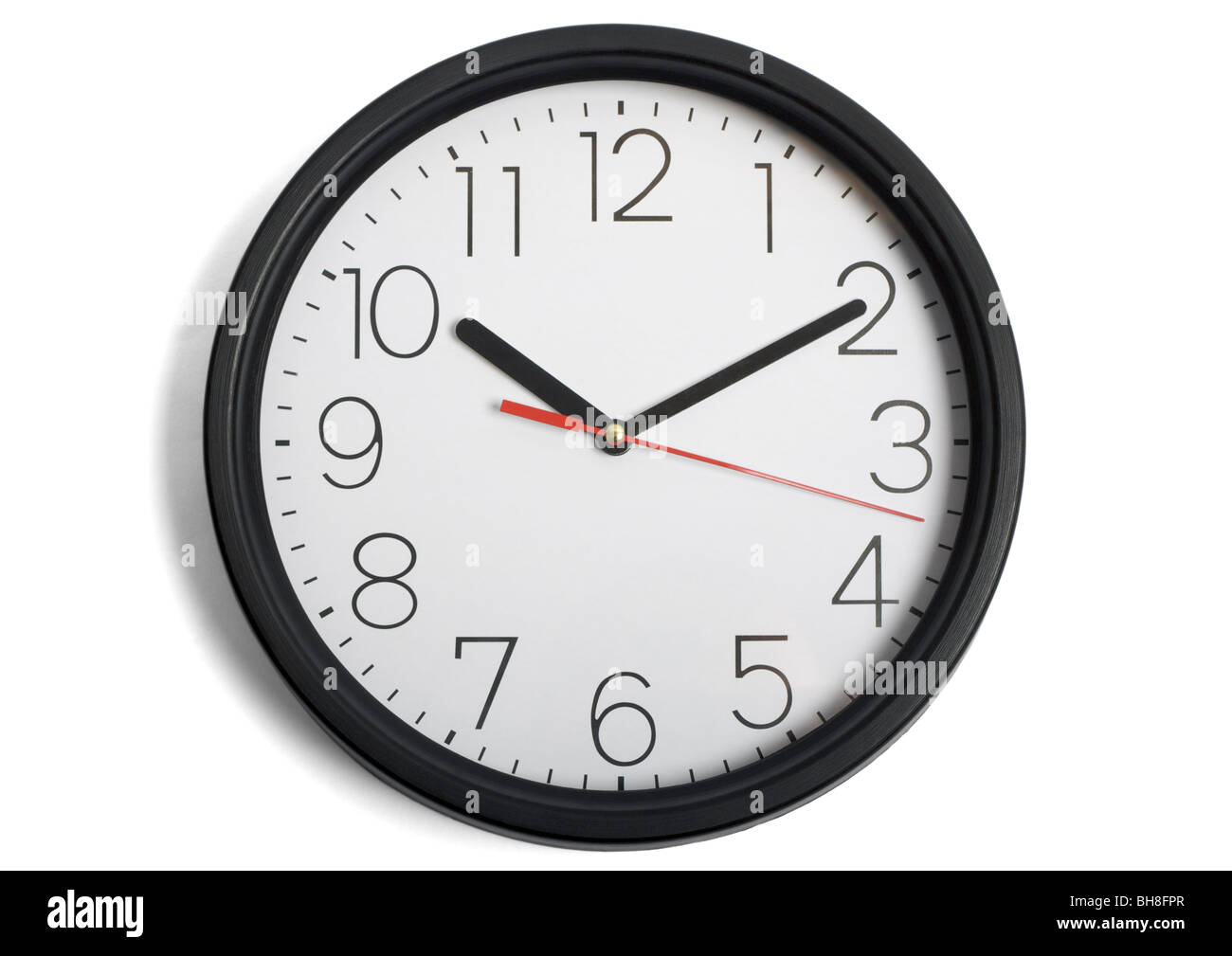 Round wall clock on white background Stock Photo