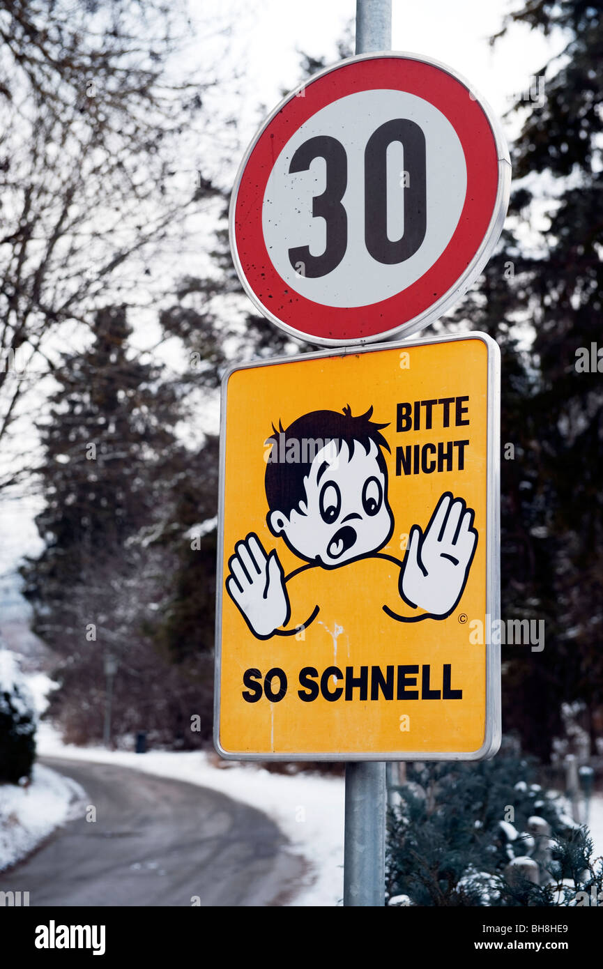 Austrian road/traffic sign saying please do not go/drive fast Stock Photo