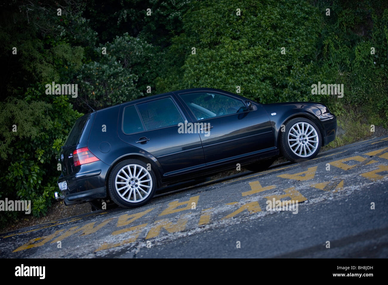Halloween Groping Fed up 2002 Black Volkswagen 2.8L. V6 6 speed manual 4motion Golf with R32 18inch  rims Stock Photo - Alamy