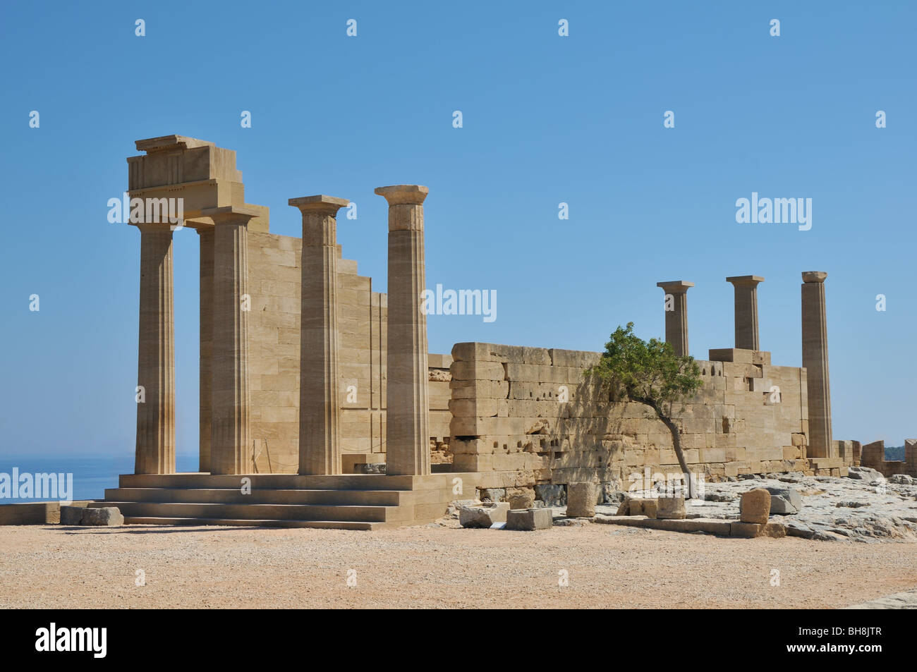 Doric temple of Athena Lindia on the acropolis of ancient Lindos. Dating from about 300 BC. Stock Photo