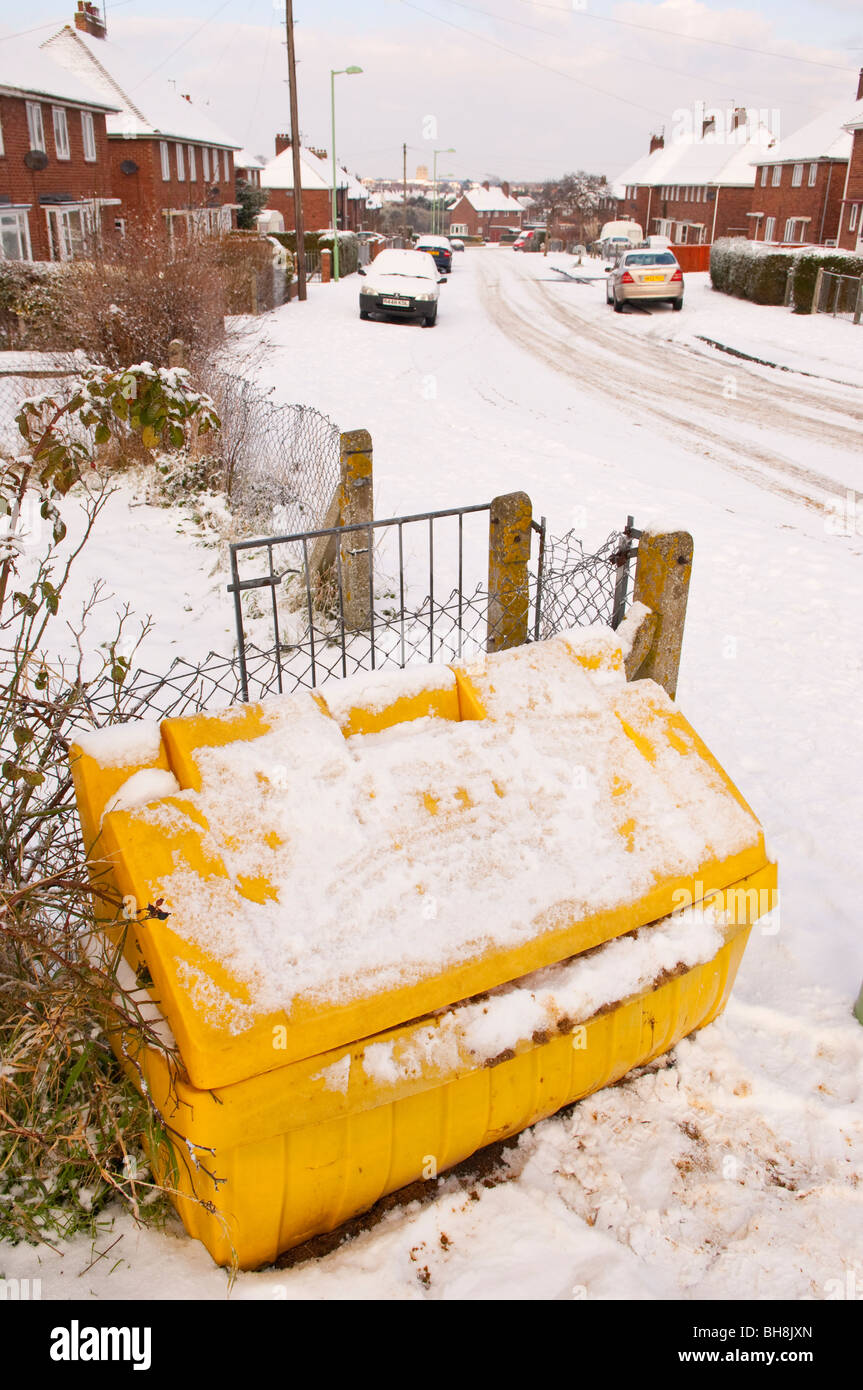 A tub filled with grit for supposedly gritting the road in the snow at Beccles , Suffolk , England , Britain , Uk Stock Photo