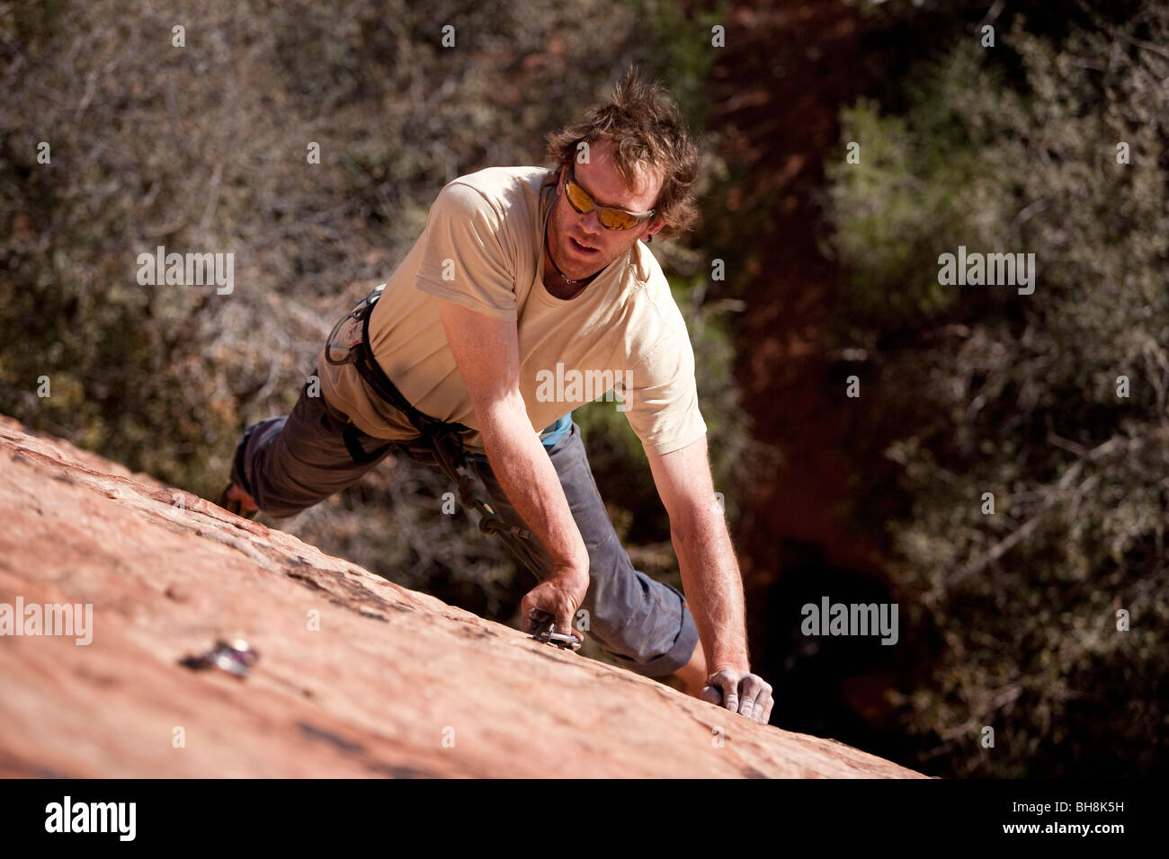 Man rock climbing, Red Rocks National Monument, Nevada, USA Stock Photo