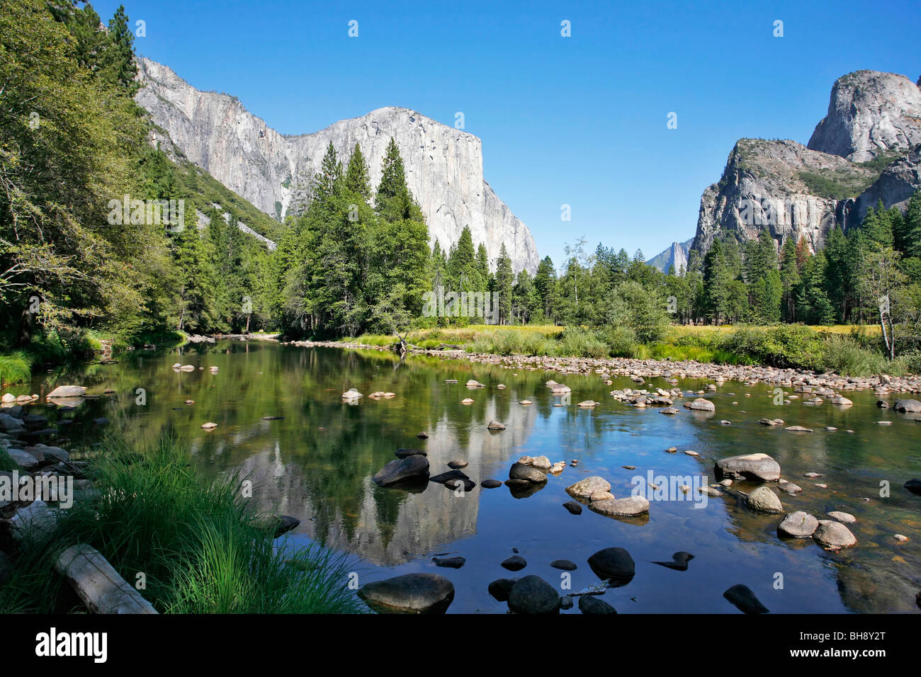 Well-known rocky monolith El -Captain are reflected in the river Mersed in Yosemite park Stock Photo