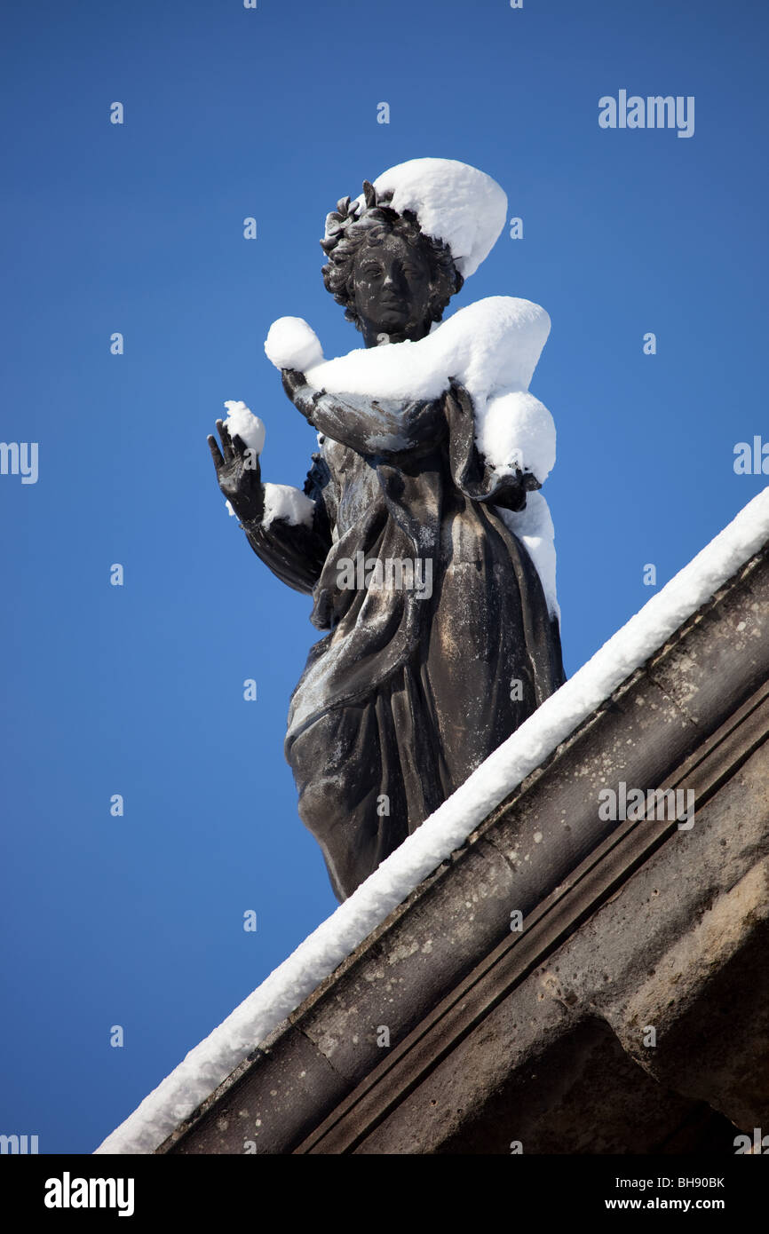 Snow Covered Statue Stock Photo