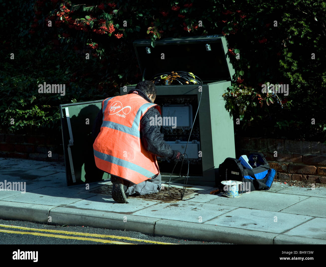BT engineer working at junction box Stock Photo Alamy