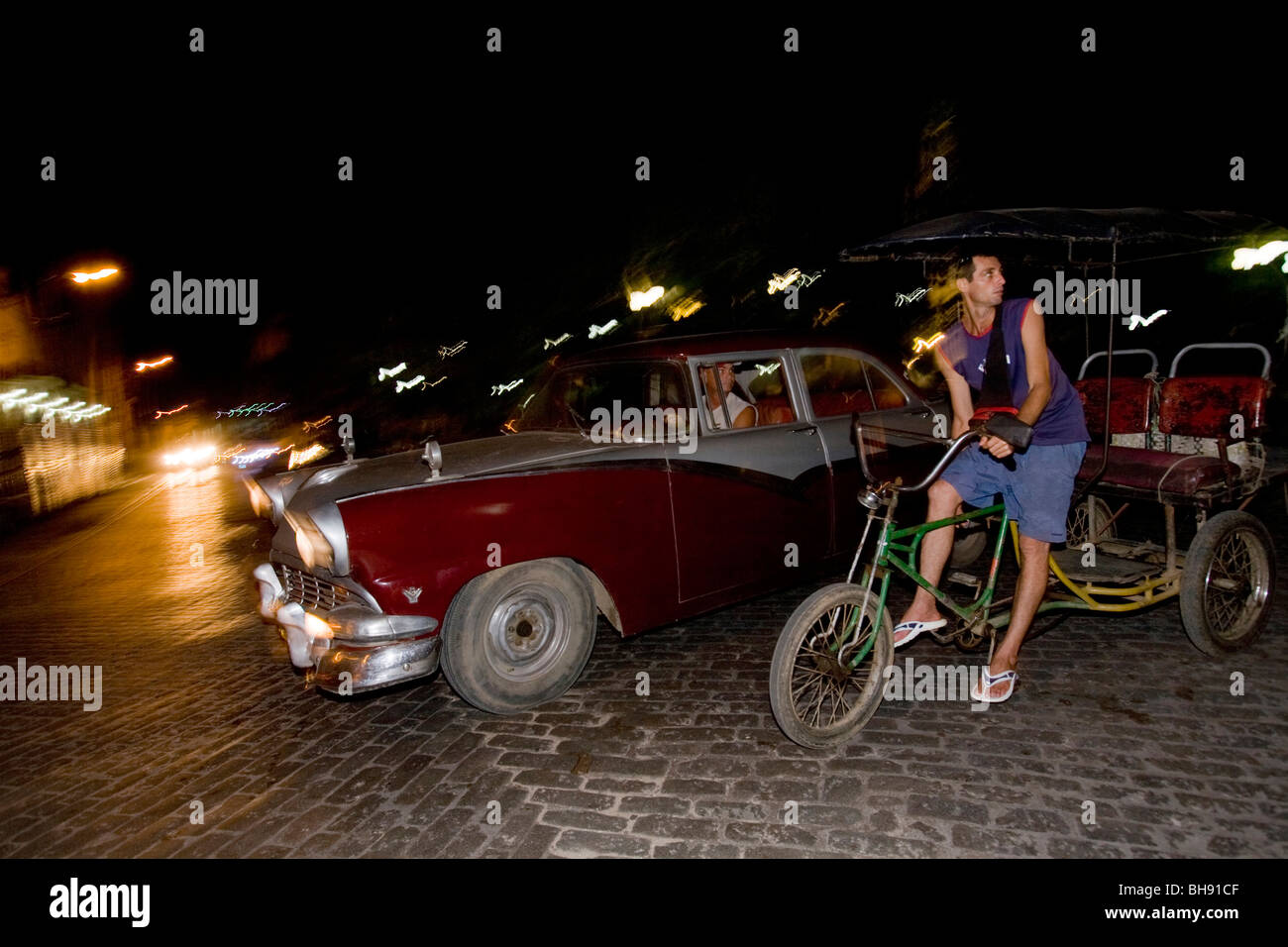 Street Scene of Nightlife, Camagueey, Caribbean Sea, Cuba Stock Photo