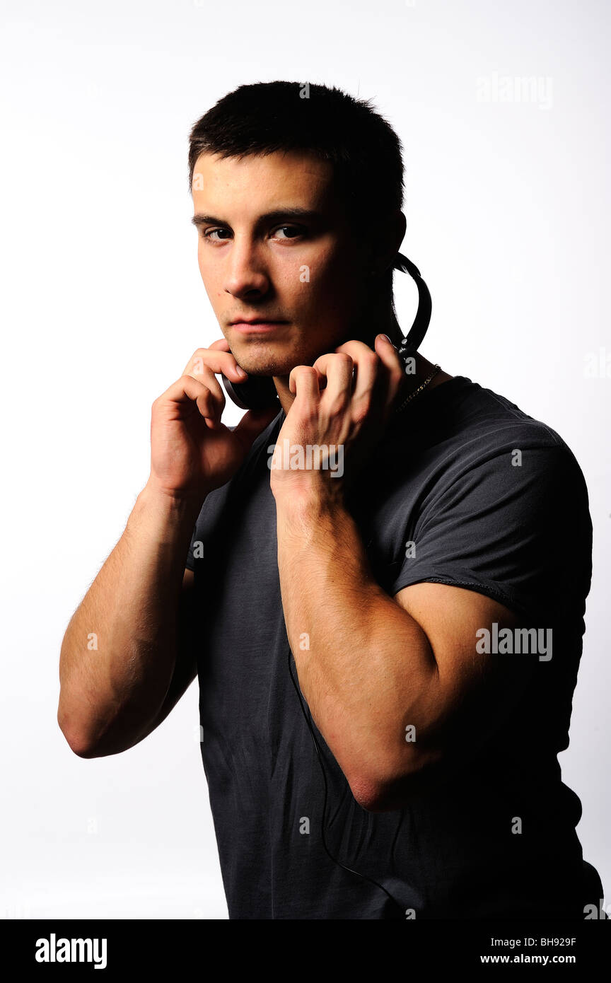 young male with head phones Stock Photo