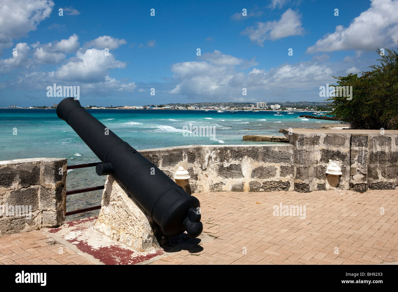 Ancient cannons facing the sea at Fort George, part of the Hilton Hotel, on the Caribbean island of Barbados Stock Photo