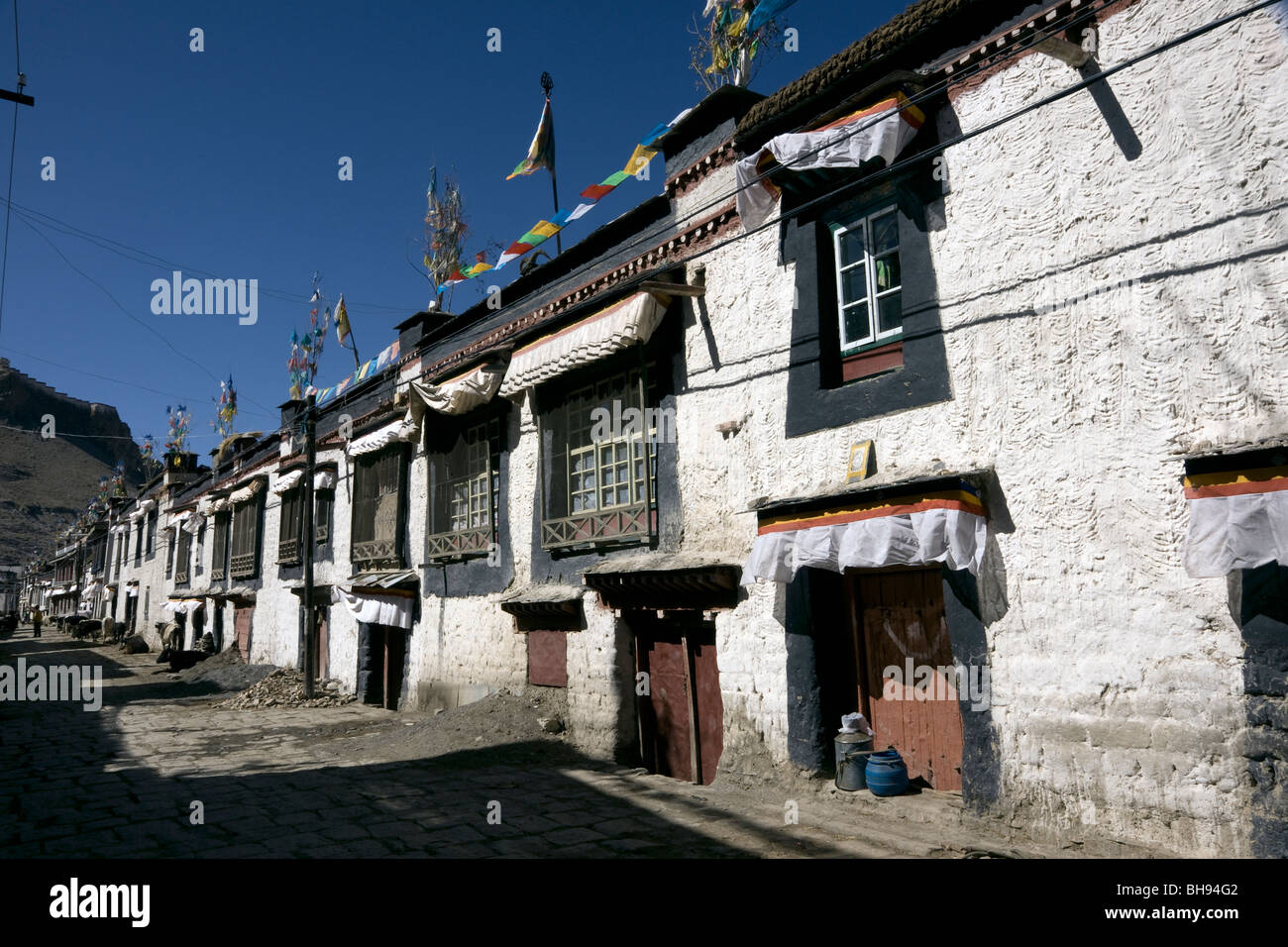 street scene in the traditional village tibetan quarter of gyantse tibet china Stock Photo