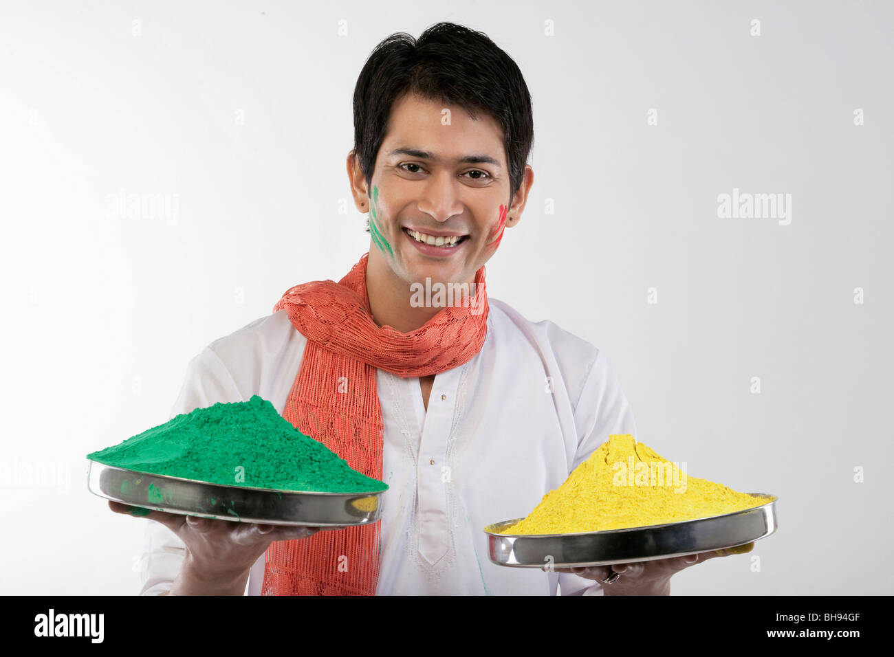 Man holding trays with colours Stock Photo