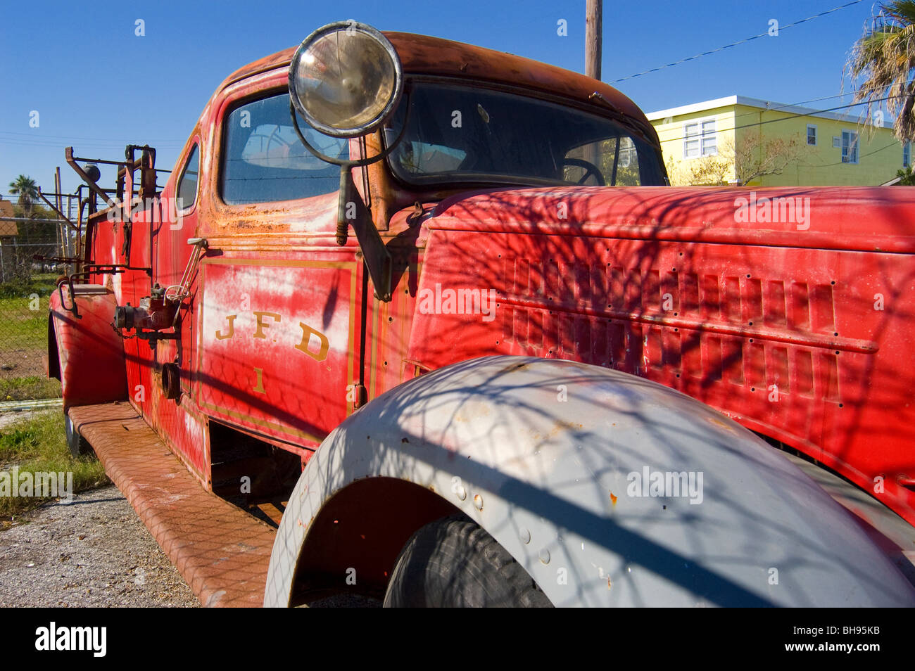 Vintage rusty fire truck in Galveston, Texas, ready for restoration