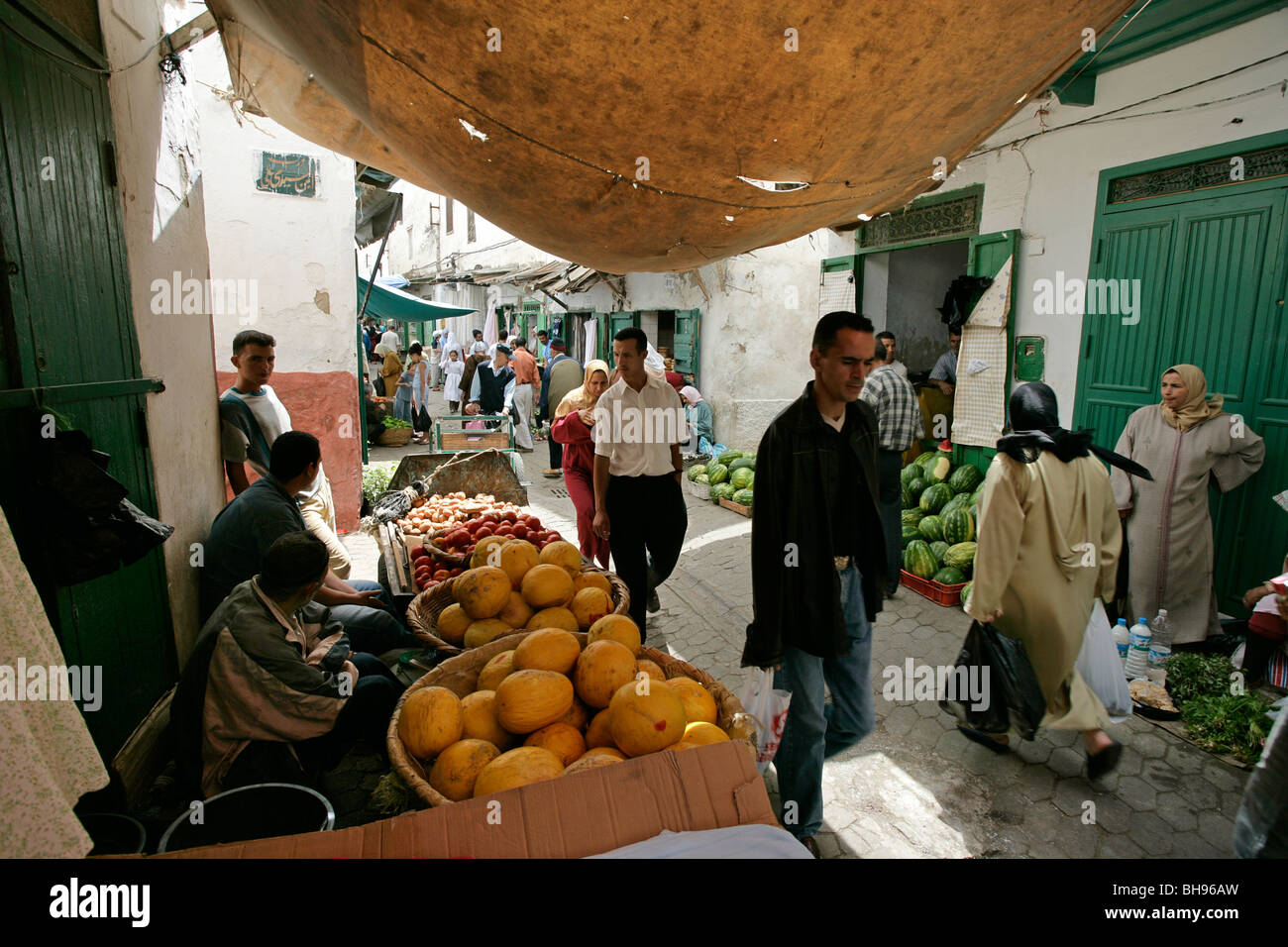 Fruit for sale at a fruit stall along one of the many narrow alleys at the casbah in Tetuon, Morocco Stock Photo
