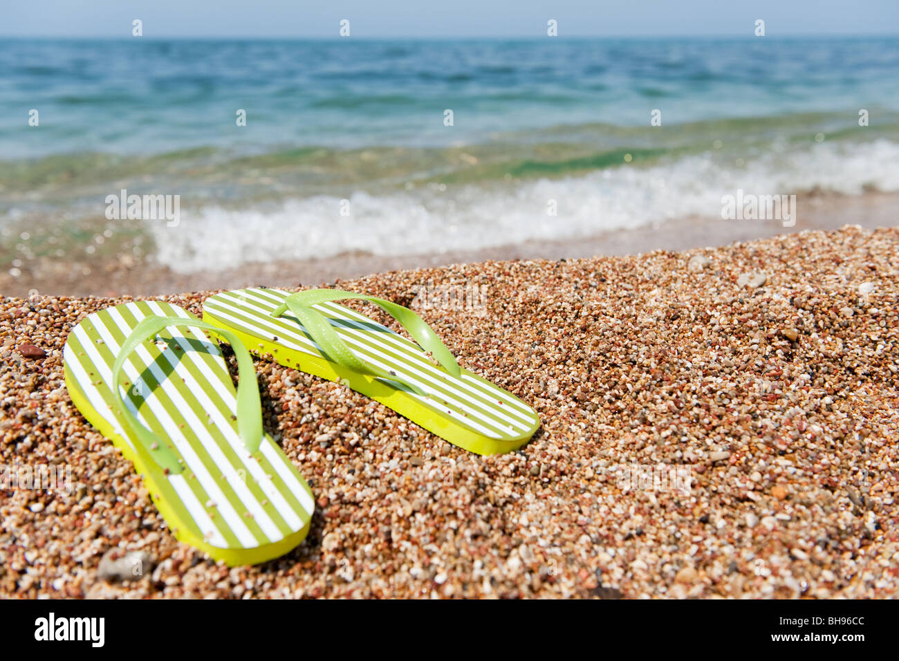 summer vacation with flip flops at the beach Stock Photo - Alamy
