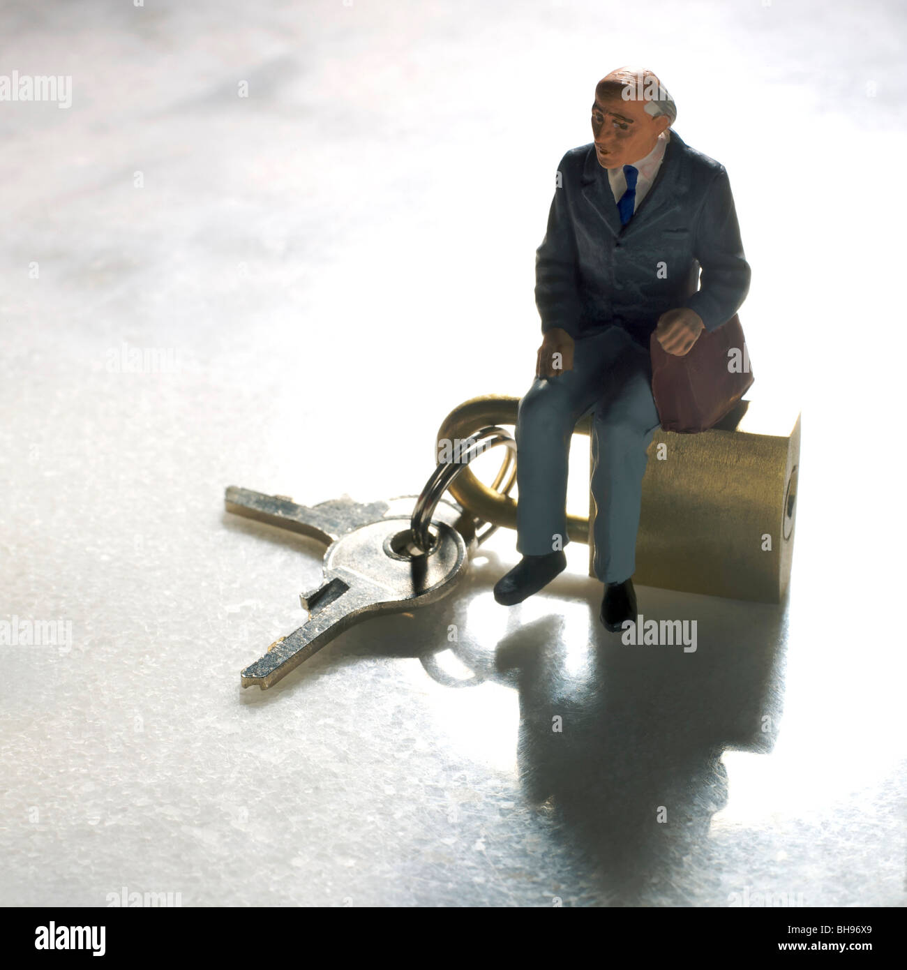 Grandfather, figurine, and keys, symbolic image for departure to old people's home Stock Photo