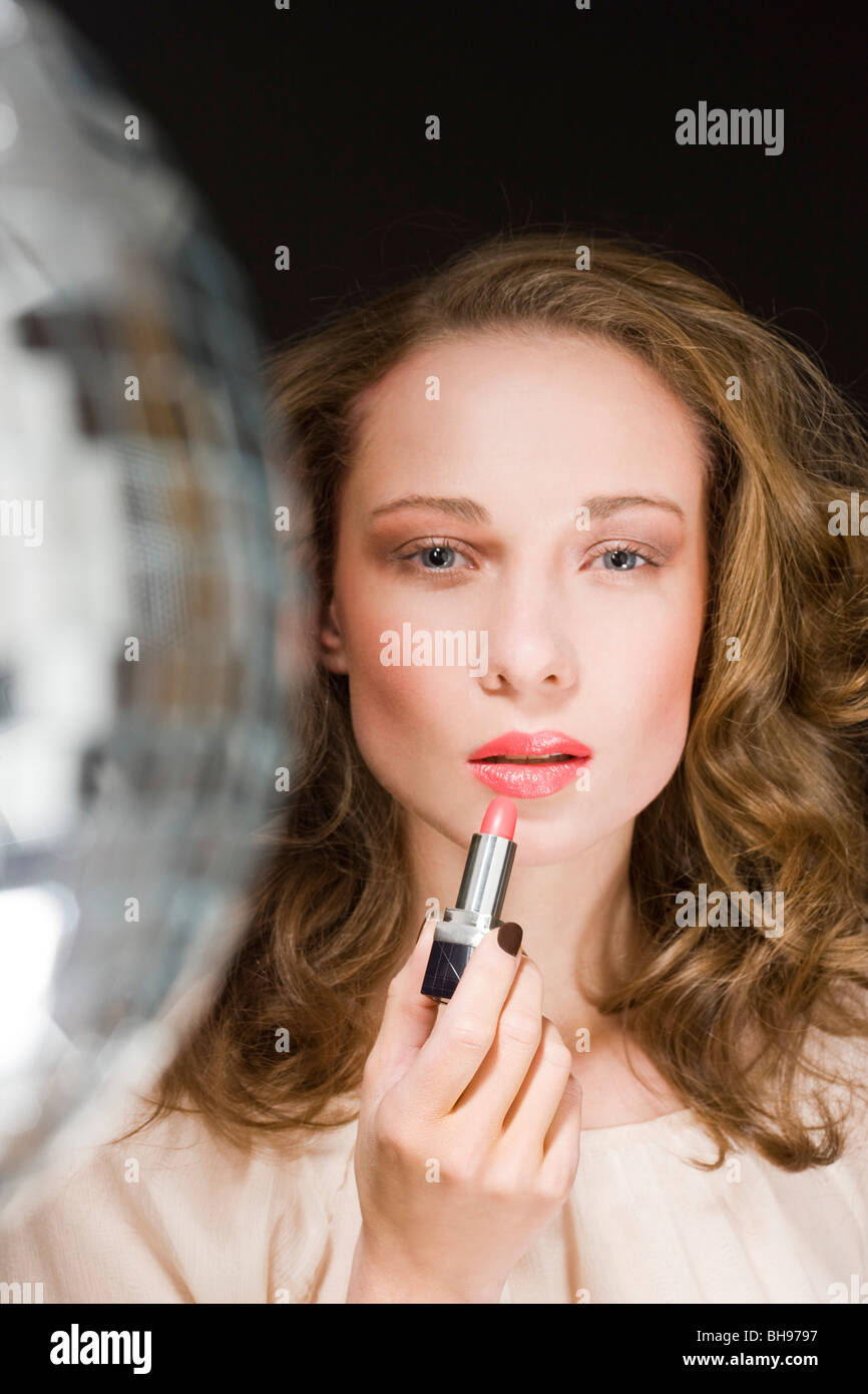 beauty woman applying red lipstick Stock Photo Alamy