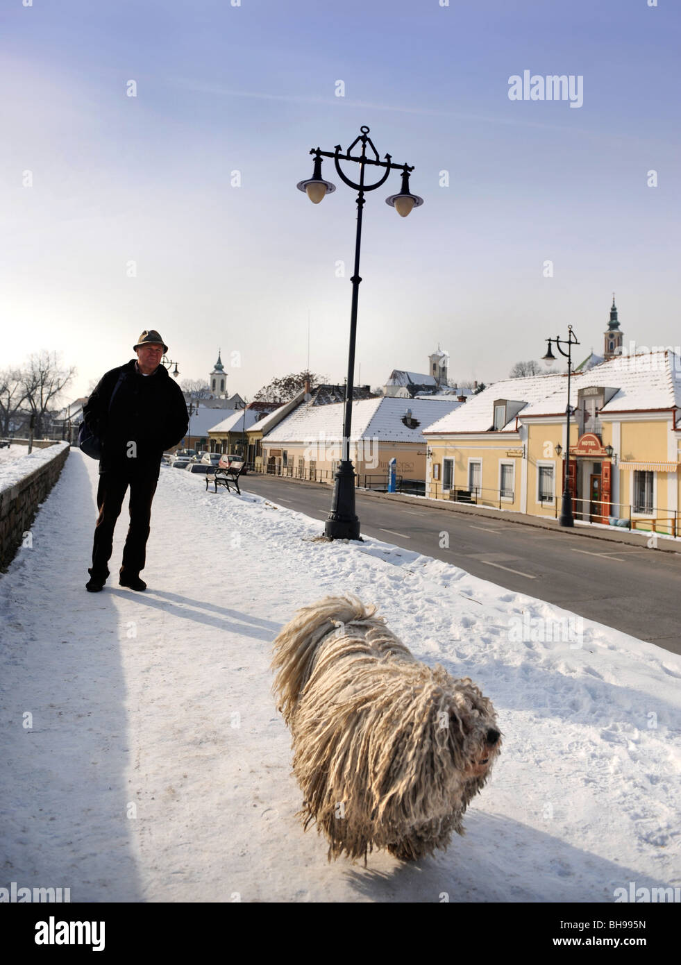 Winter scene in Szentendre Hungary with a man walking a traditional