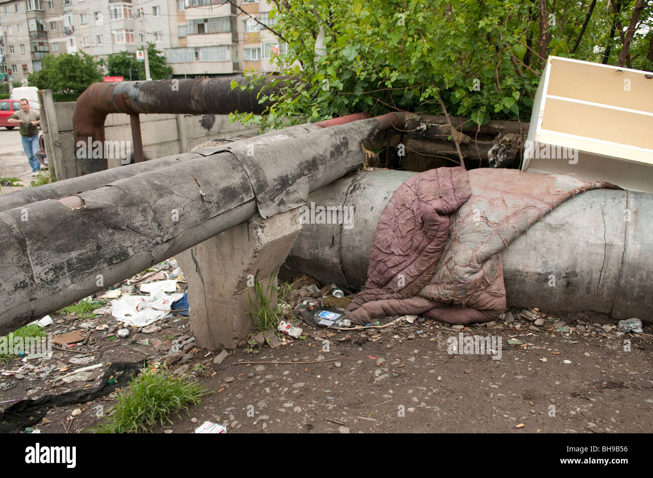 Steam pipes to heat city with Asbestos cladding where homeless people live Ploiesti Romania Eastern Europe Stock Photo