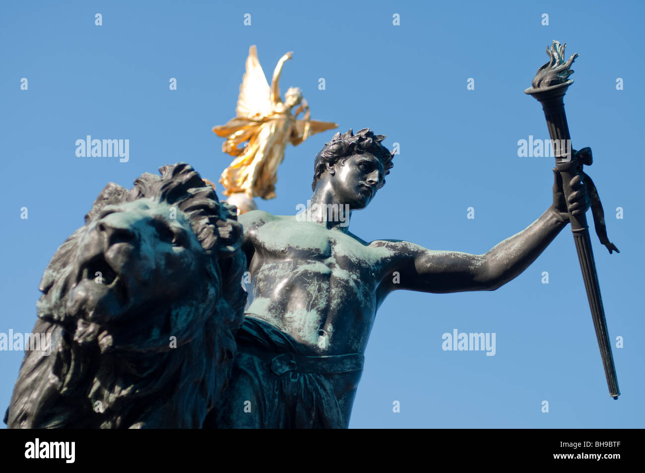 Statues on the Victoria Memorial Fountain outside Buckingham Palace in