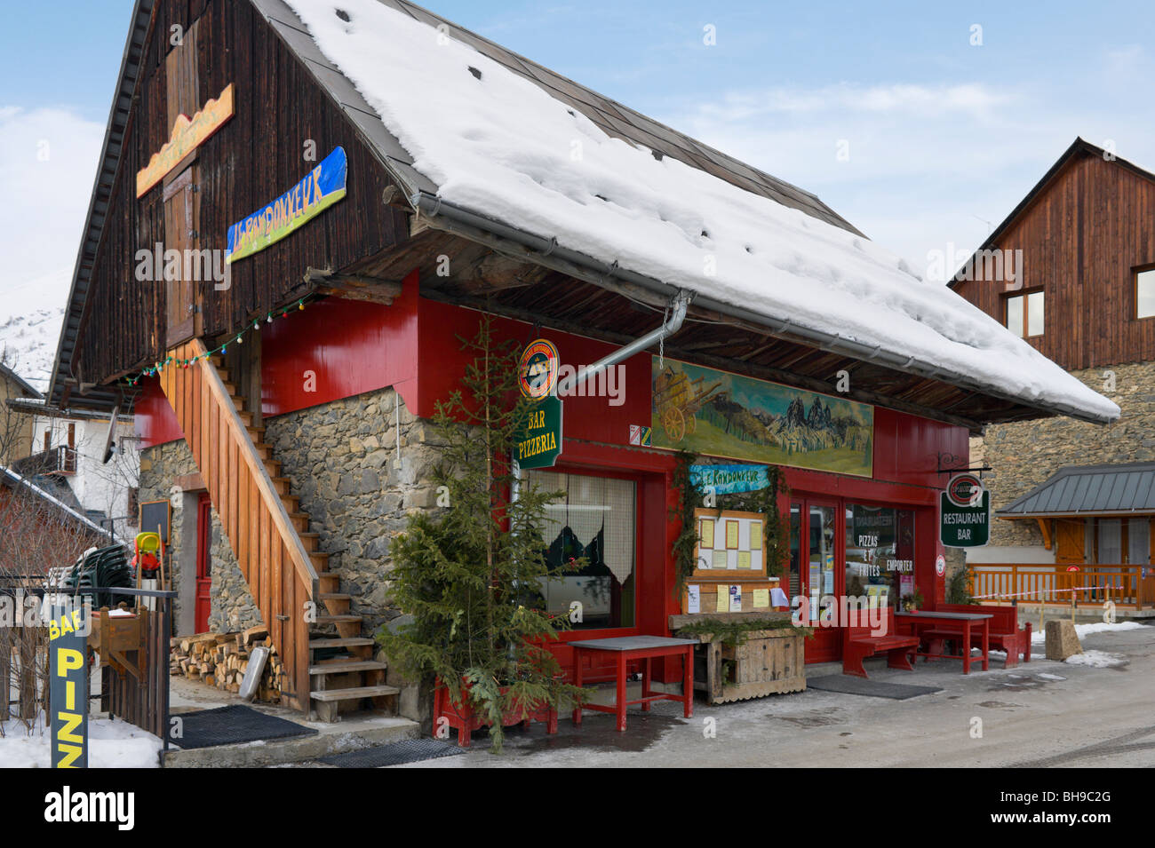 Bar and Pizzeria in the centre of the village of St Jean d'Arves, Les Sybelles ski area, Maurienne massif, France Stock Photo