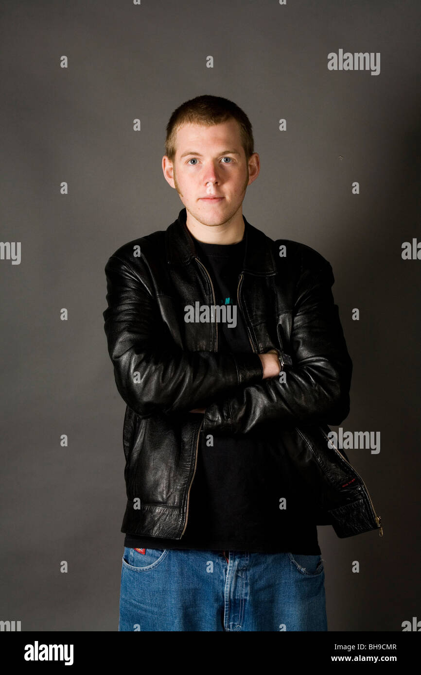 Man in photographic studio pulling facial expression. Stock Photo