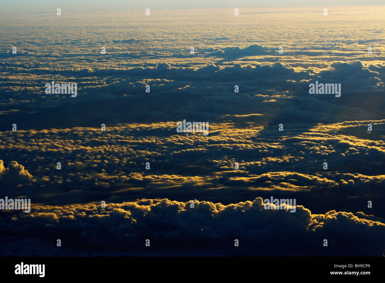 Aerial view of cloud formation at 40,000 feet from an airplane. Stock Photo
