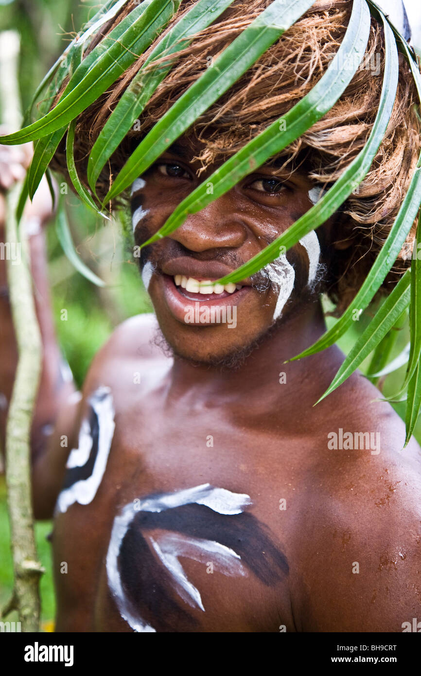This youthful warrior-dancer gave a welcome performance for tourists Espirit Santo Vanuatu Melanesia Stock Photo