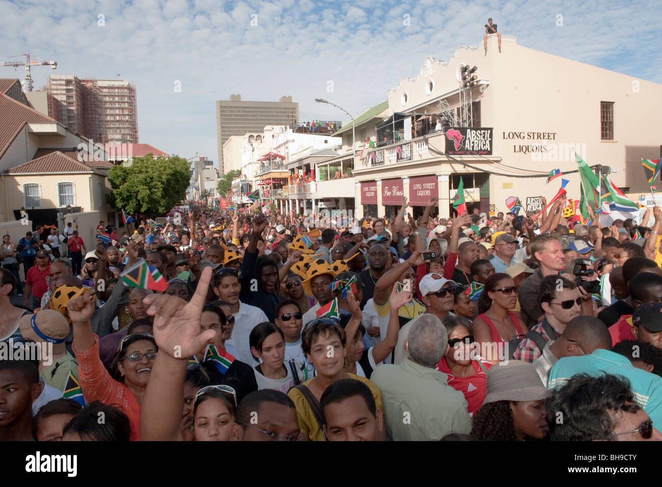 Football fans celebrating on the FIFA Fan Mile in Cape Town South Africa Stock Photo