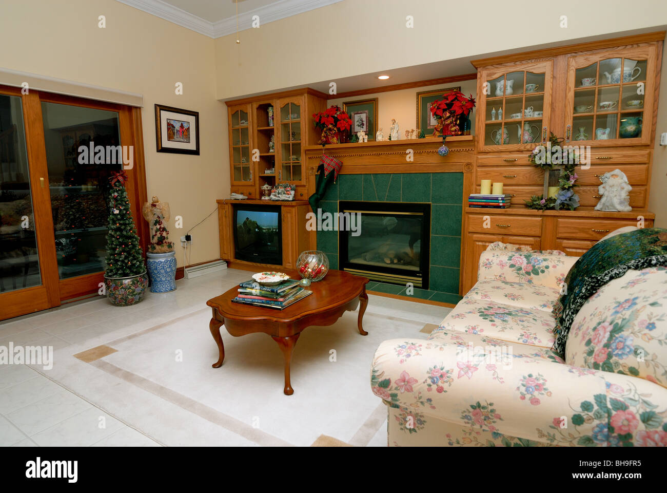 A tastefully decorating formal living room, decorated for the holiday season. Stock Photo