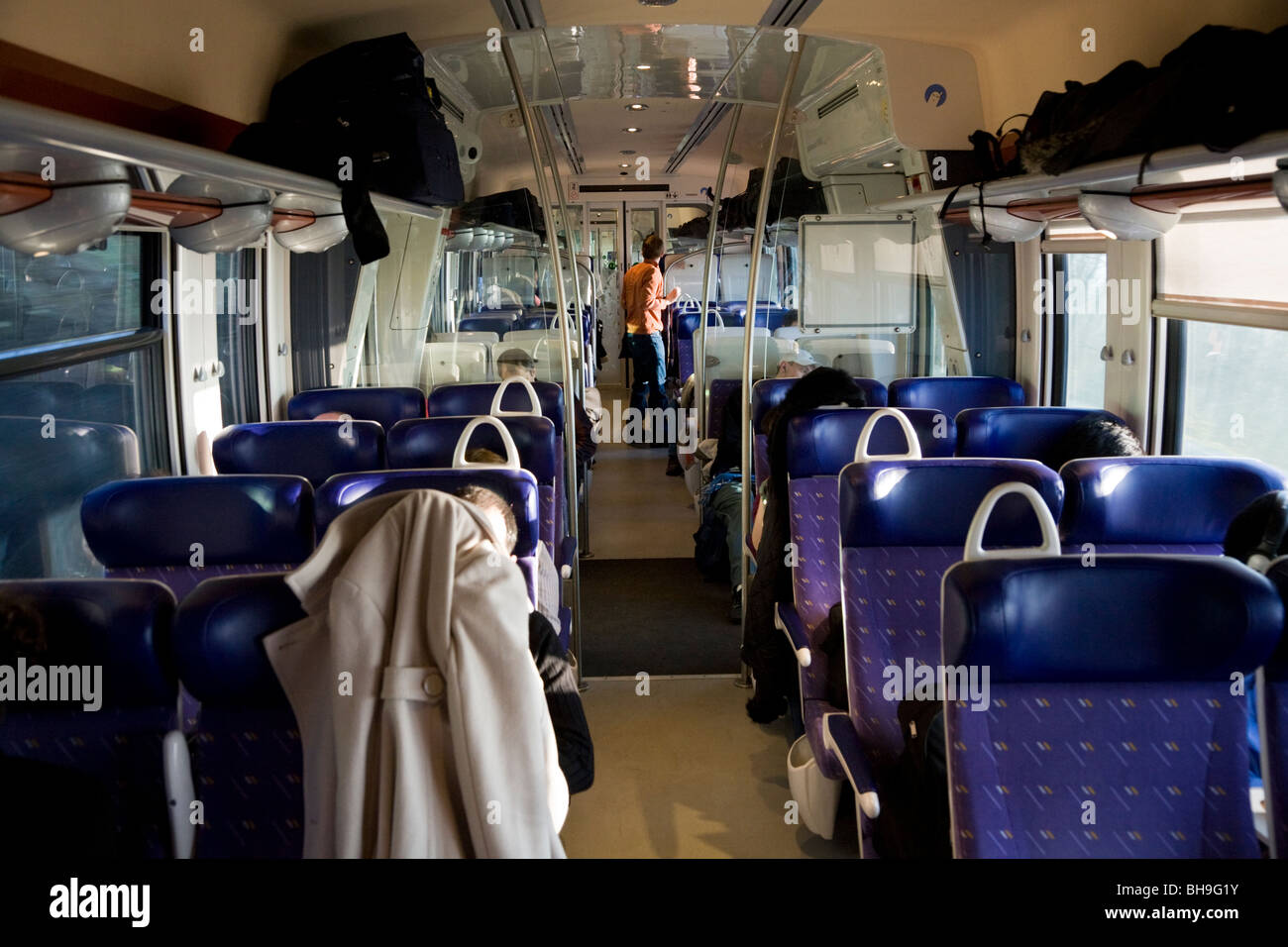 Inside a carriage which is part of a French TER – Train Express Regional – train, bound for Lyon in France. Stock Photo