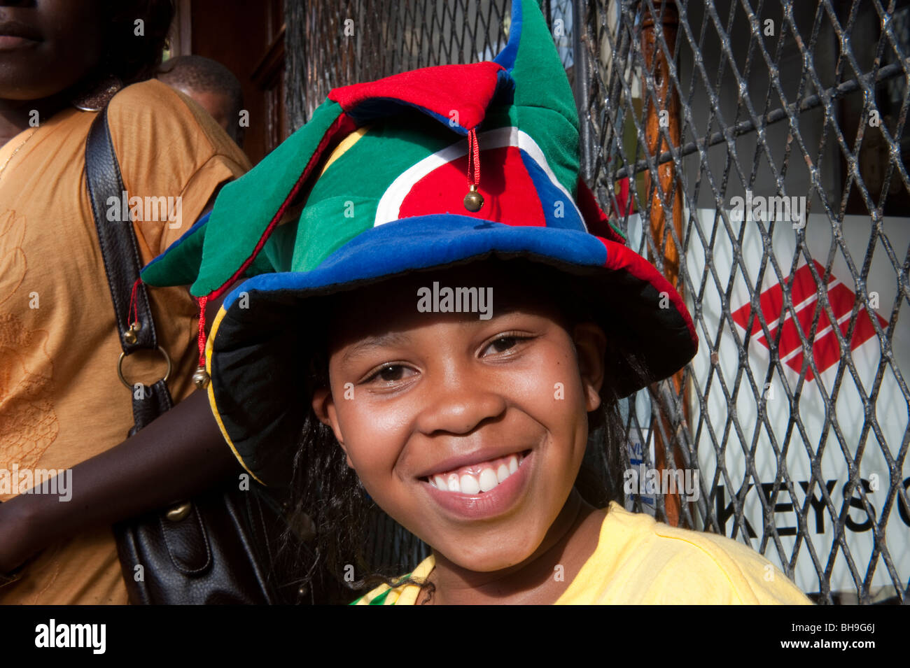 Girl wearing a South African football fan hat Cape Town South Africa