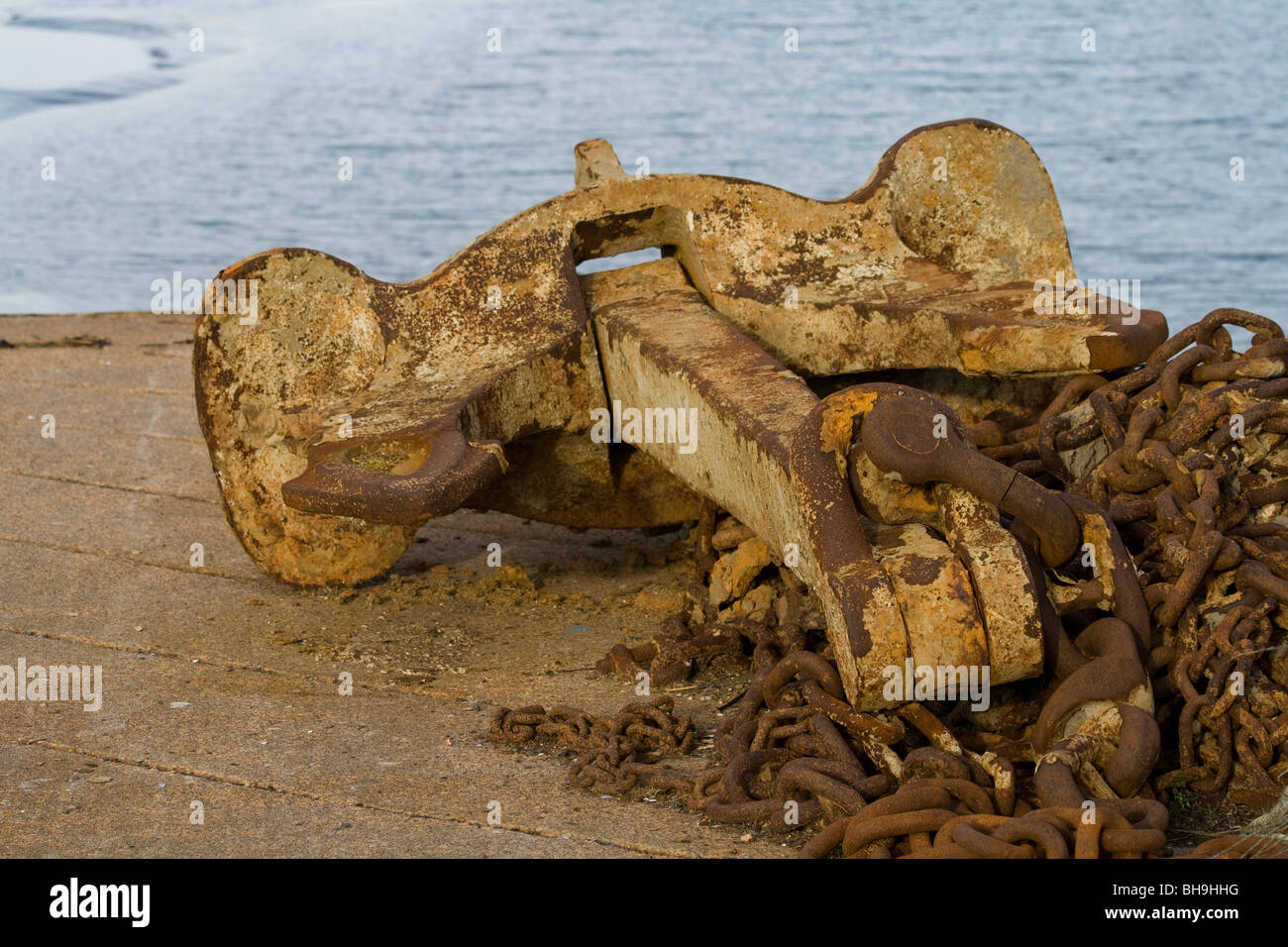 Anchor on the dock side Stock Photo Alamy