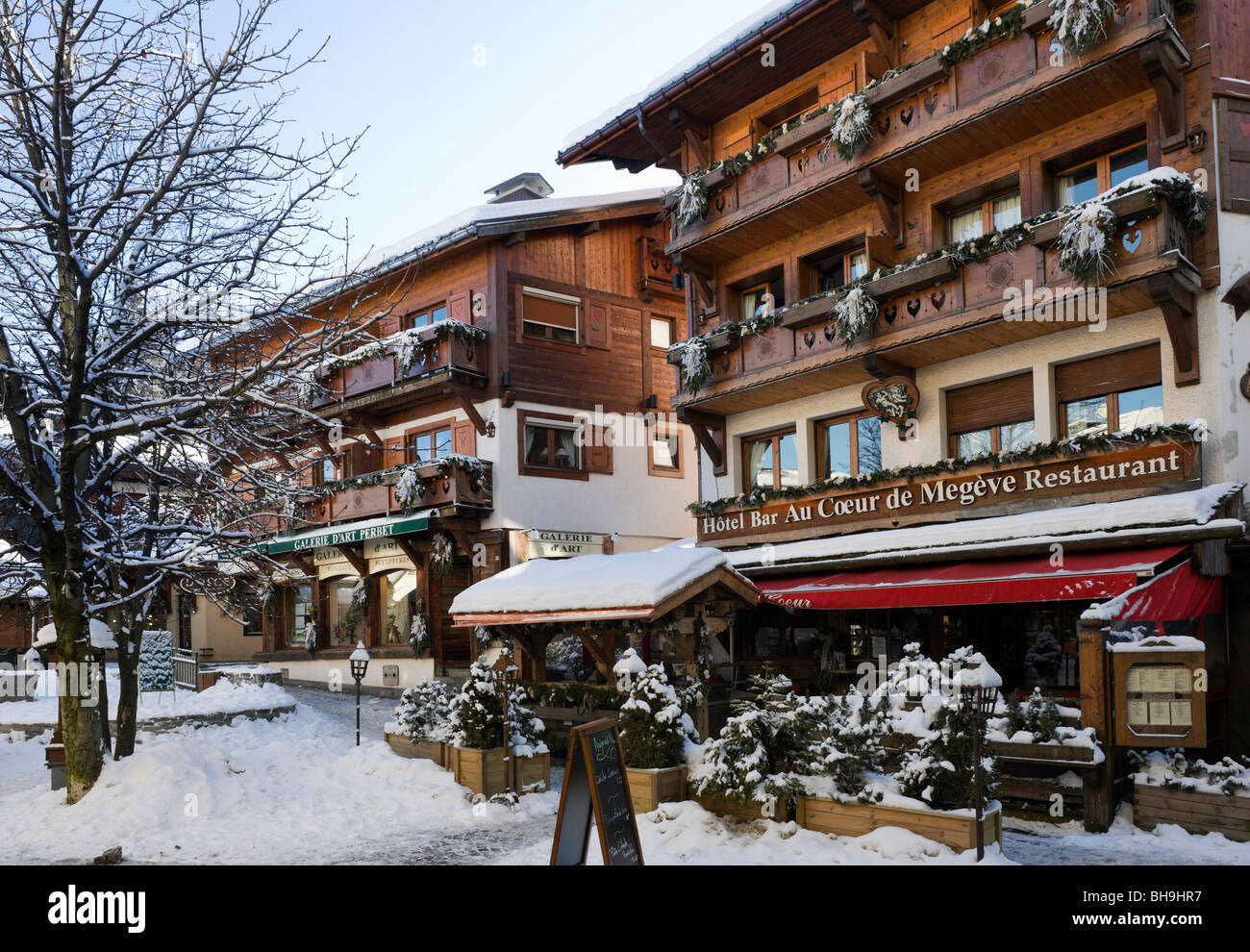 Restaurant and shops in the centre of the resort of Megeve, Haute Savoie, France Stock Photo