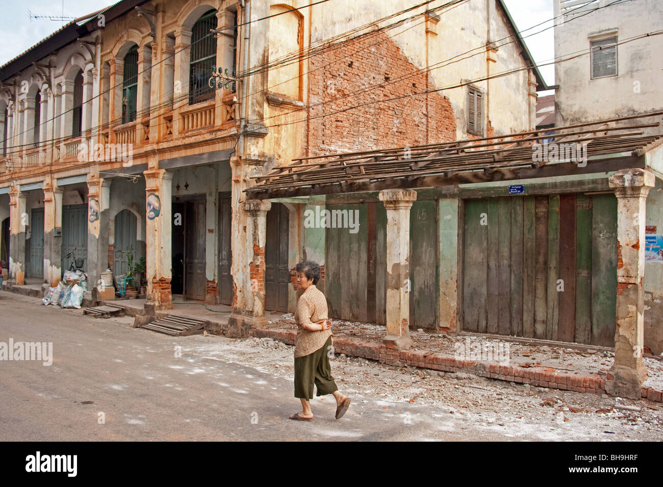 Crumbling French buildings in the old French colonial town of Savannakhet in southern Laos Stock Photo