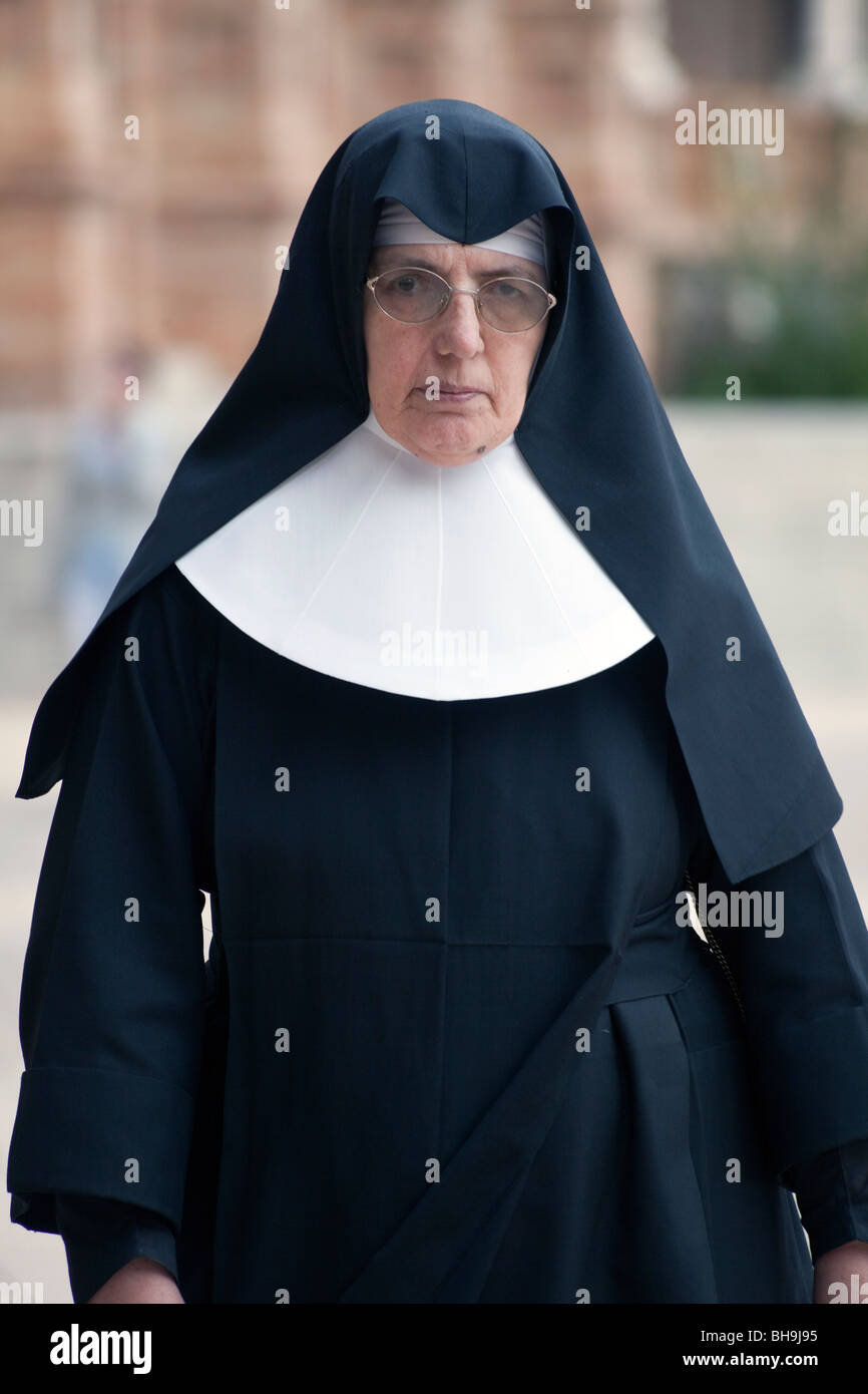 Spanish nun, visiting Plaza de Espagna, Seville, Spain Stock Photo Alamy
