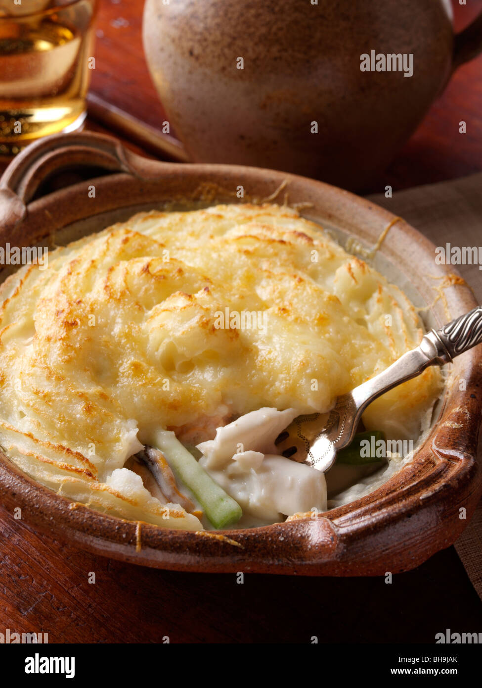 Individual fish pie seafood main meals Stock Photo Alamy