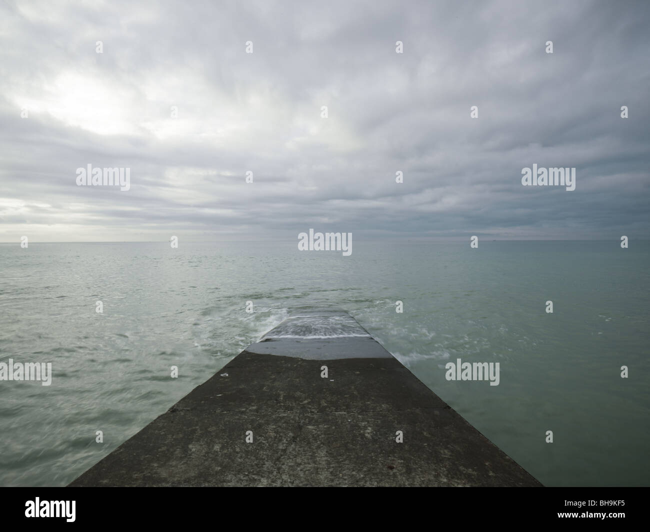 jetty entering sea Stock Photo - Alamy
