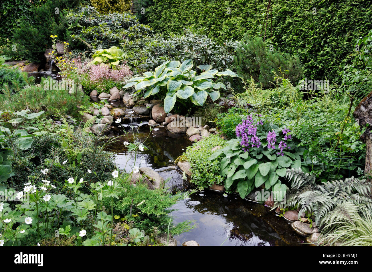 Perennial garden with brook. Design: Marianne and Detlef Lüdke Stock Photo