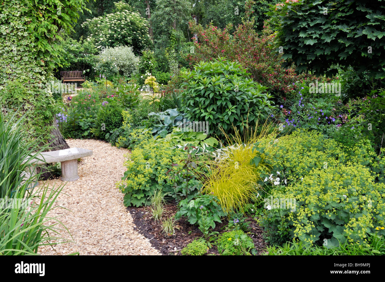 Perennial garden with seating area. Design: Marianne and Detlef Lüdke Stock Photo