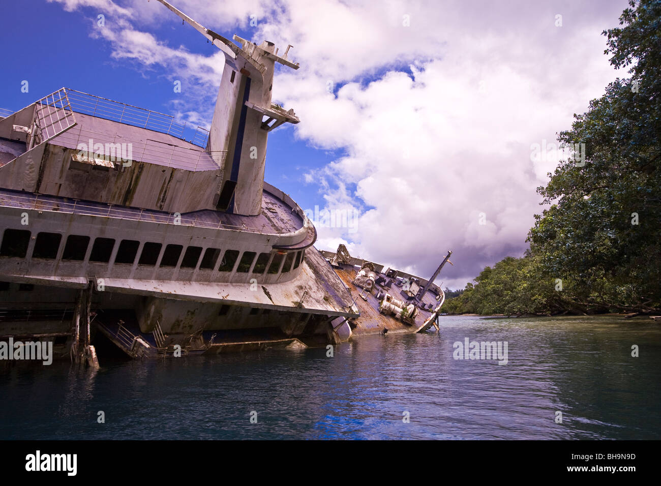 The expedition ship World Discoverer hit a reef and went aground in 2001 is now  a landmark Roderick Bay Nggela Solomon Islands Stock Photo