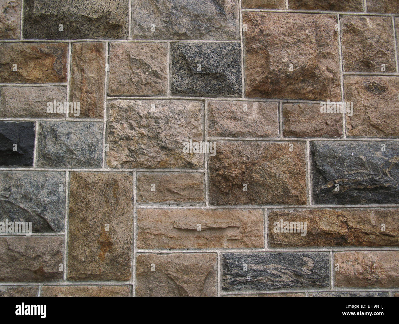 multi stone wall pointing balanced vertical and horizontal stones building materials Archeciture