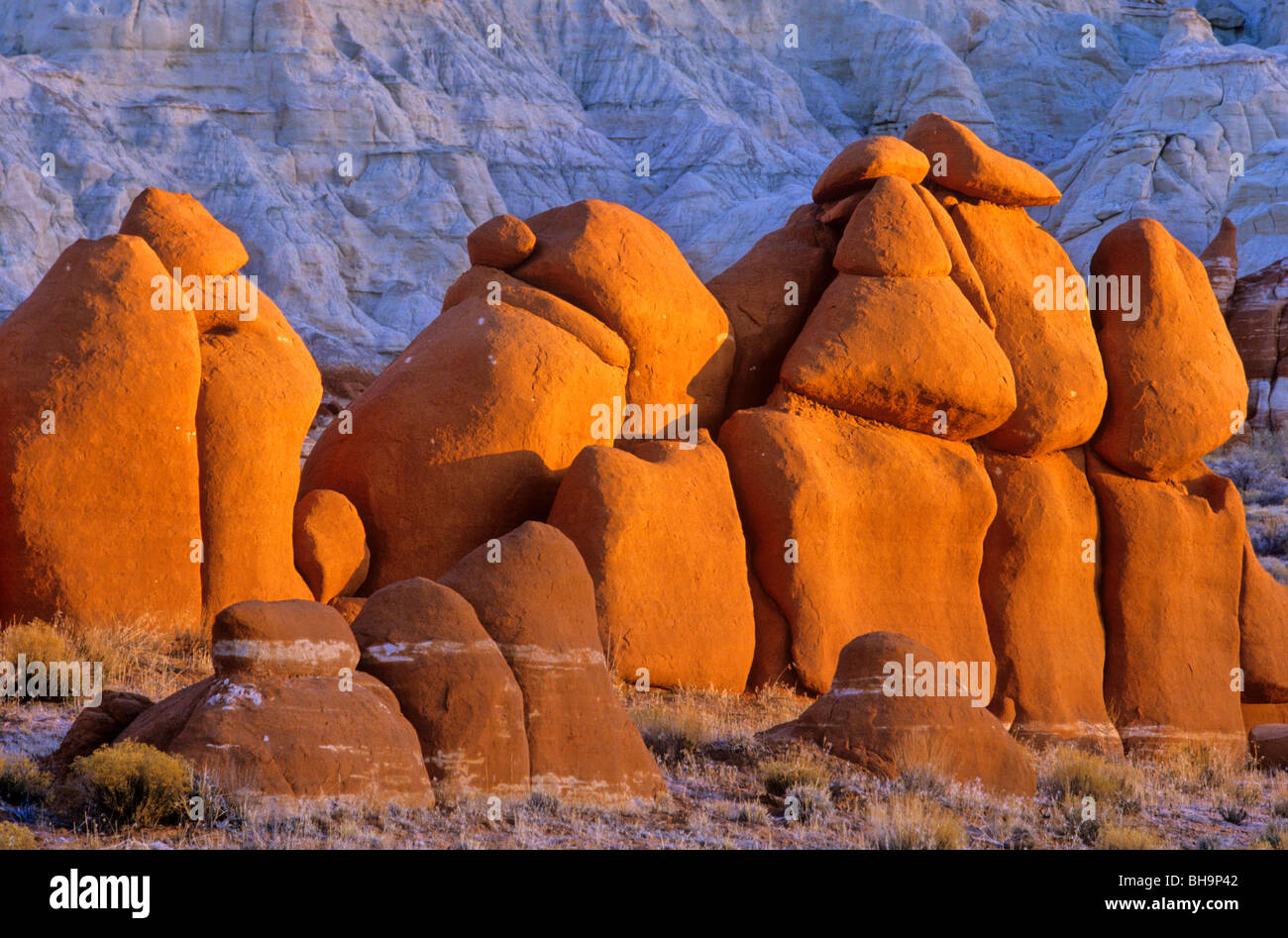 Red rock boulders at sunrise in Blue Canyon area of Moenkopi Wash south of Tonalea, Arizona, USA Stock Photo